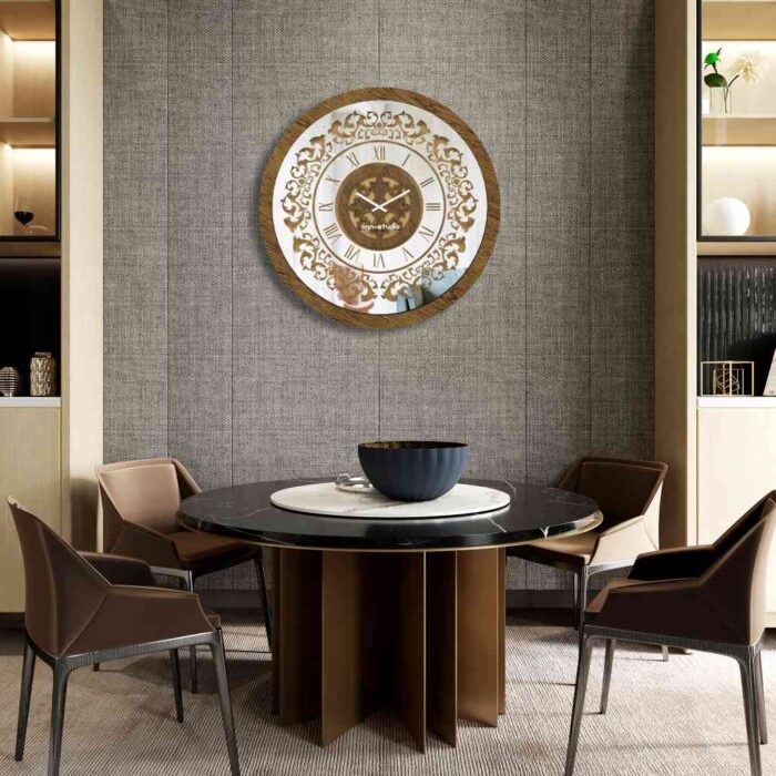 Add a touch of timeless elegance to your living space with this exquisite Round Unique Gold Patina Wall Clock. The intricate frame boasts a royal vintage effect, creating a luxurious atmosphere in any room. The mirrored design adds a touch of glamour, while the boho style clock enhances the overall aesthetic. Perfect for a chic living room, bedroom, or office, this stunning piece of wall art effortlessly combines style and functionality. Make a statement with this one-of-a-kind wall clock that will surely elevate your decor.