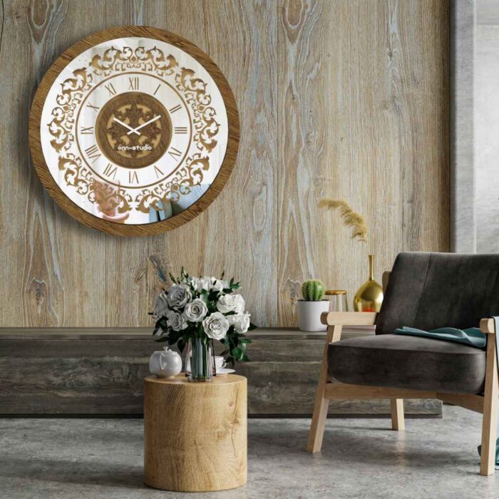 Add a touch of timeless elegance to your living space with this exquisite Round Unique Gold Patina Wall Clock. The intricate frame boasts a royal vintage effect, creating a luxurious atmosphere in any room. The mirrored design adds a touch of glamour, while the boho style clock enhances the overall aesthetic. Perfect for a chic living room, bedroom, or office, this stunning piece of wall art effortlessly combines style and functionality. Make a statement with this one-of-a-kind wall clock that will surely elevate your decor.