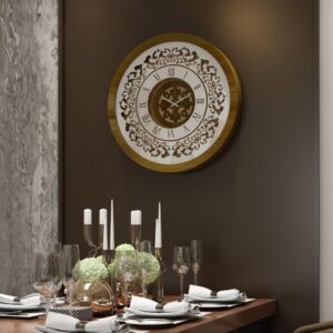 Add a touch of timeless elegance to your living space with this exquisite Round Unique Gold Patina Wall Clock. The intricate frame boasts a royal vintage effect, creating a luxurious atmosphere in any room. The mirrored design adds a touch of glamour, while the boho style clock enhances the overall aesthetic. Perfect for a chic living room, bedroom, or office, this stunning piece of wall art effortlessly combines style and functionality. Make a statement with this one-of-a-kind wall clock that will surely elevate your decor.