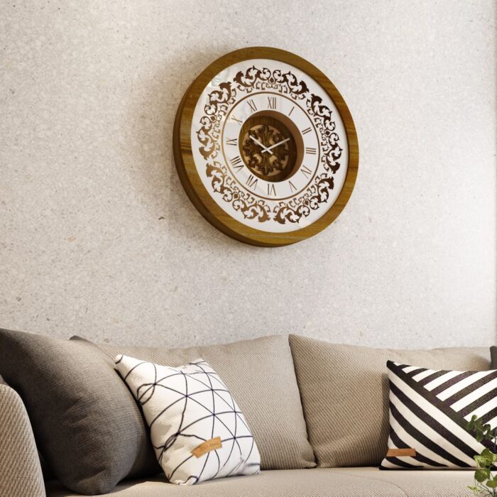 Add a touch of timeless elegance to your living space with this exquisite Round Unique Gold Patina Wall Clock. The intricate frame boasts a royal vintage effect, creating a luxurious atmosphere in any room. The mirrored design adds a touch of glamour, while the boho style clock enhances the overall aesthetic. Perfect for a chic living room, bedroom, or office, this stunning piece of wall art effortlessly combines style and functionality. Make a statement with this one-of-a-kind wall clock that will surely elevate your decor.