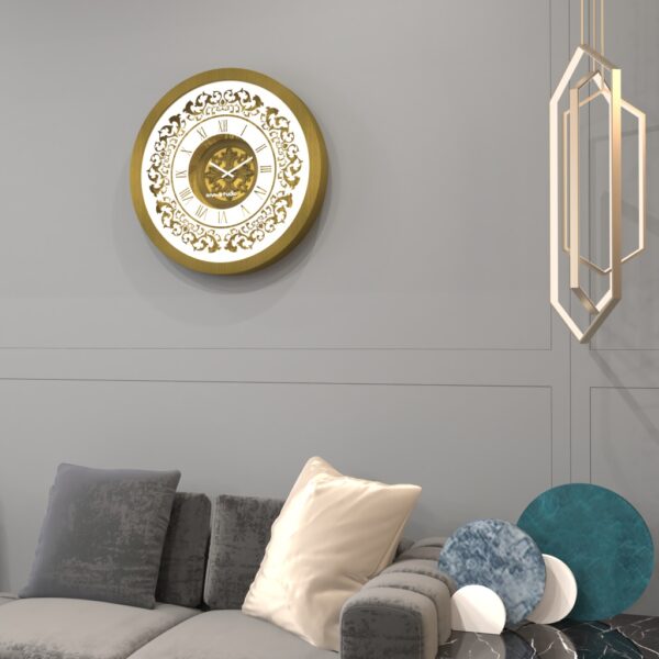 Add a touch of vintage charm to your home or office with this exquisite Vintage Floral Bronze Effect Wall Clock. Featuring elegant Roman numerals on a large round mirror, this artisan timekeeper is a statement piece that will elevate any space. Handmade with care, this wooden clock is perfect for adding a touch of sophistication to your living room decor. Make a statement with this elegant wall clock that combines beauty and functionality in one stunning piece.