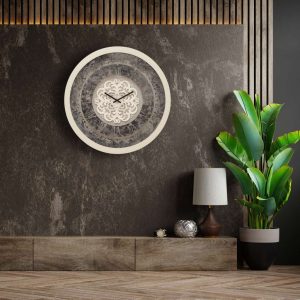 Round shell patina mirrored wall clock hanging in stone themed room.