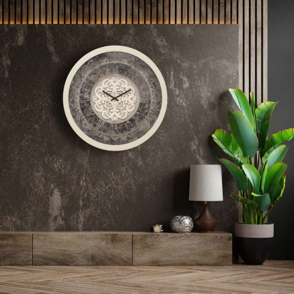 Add a touch of timeless elegance to your living space with our Round Beige Colour Wall Clock. This vintage-inspired timepiece features classic Roman numerals and a traditional floral design, making it the perfect statement piece for any room. Handcrafted by artisans, this large wall clock is truly one-of-a-kind and will add a vintage charm to your home decor. Its decorative mirrored frame adds a touch of luxury, while the silent clock mechanism ensures a peaceful ambiance. Whether you're looking to enhance your living room decor or searching for a unique housewarming gift, this handmade wall clock is sure to impress. Embrace the beauty of yesteryears with this aesthetic design that complements both retro and boho wall art styles. Elevate your interior design with this stunning addition to your room decor.