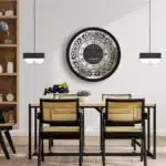 Add a touch of timeless elegance to your living space with our Round Black Color Designer Wall Clock. This exquisite clock features Roman numerals and a vintage artisan design, making it the perfect statement piece for your home decor. Crafted with precision and attention to detail, this large wall clock exudes luxury and charm. The rhinestone sparkling crystal detail adds a touch of glamour and sophistication, while the silent operation ensures a peaceful ambiance in any room. This decorative mirrored clock is a must-have for those who appreciate aesthetic design and vintage-inspired accents. Surprise your loved ones with this handmade wall clock as a housewarming gift that will elevate their interior design. Embrace the beauty of this unique wall clock that doubles as boho wall art and rhinestone decor, bringing a touch of classic luxury to your living space. Elevate your home with this stunning piece of luxury classic home accessories.