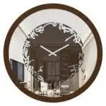 Add a touch of timeless elegance to your home with this traditional round-shaped handmade wall clock. Featuring five stunning surrounding colors - black, gray, gold, beige, and walnut, this clock is a true beauty. The captivating design element of Persian calligraphy around the mirrored clock adds a stylish and one-of-a-kind touch that makes this piece truly special. This large modern wall clock is perfect for any room in your home, whether it's in the kitchen, living room, or bedroom. Its oversized silhouette ensures it will make a statement on any wall, while its silent movement ensures a peaceful atmosphere. Upgrade your décor with this brilliant and beautiful piece today!