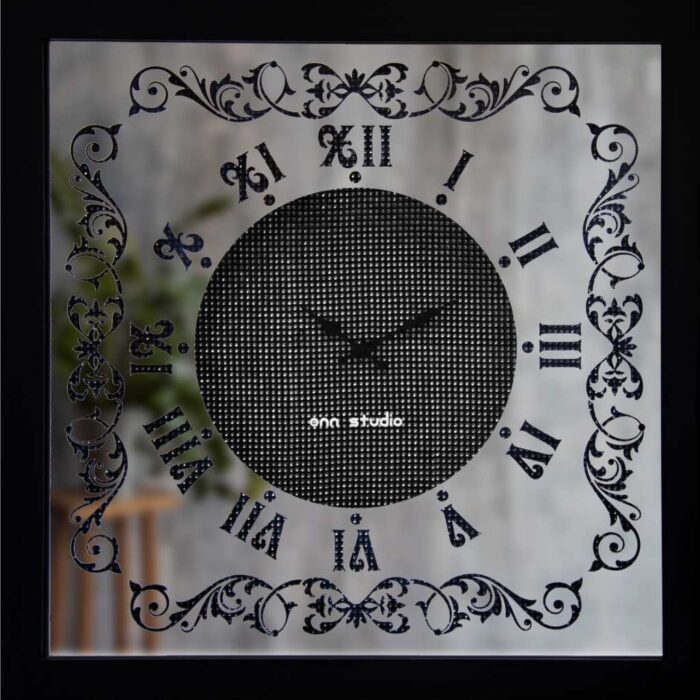 Add a touch of vintage charm to your living space with this exquisite Square Black Colour Designer Wall Clock. The clock features elegant Roman numerals and a silent mechanism, making it a practical yet artistic addition to any room. Handmade by artisan craftsmen, this Large wall clock is a statement piece that exudes luxury and classic charm. The intricate rhinestone sparkling crystal detailing enhances its aesthetic design, making it a unique wall clock perfect for boho wall art enthusiasts. This decorative mirrored clock is a must-have for interior design lovers looking to elevate their room decor. Surprise your loved ones with this stunning piece as a housewarming gift, sure to become a focal point in any home. Elevate your living room decor with this Rhinestone Decor piece and indulge in the timeless beauty of this luxury classic home accessory.