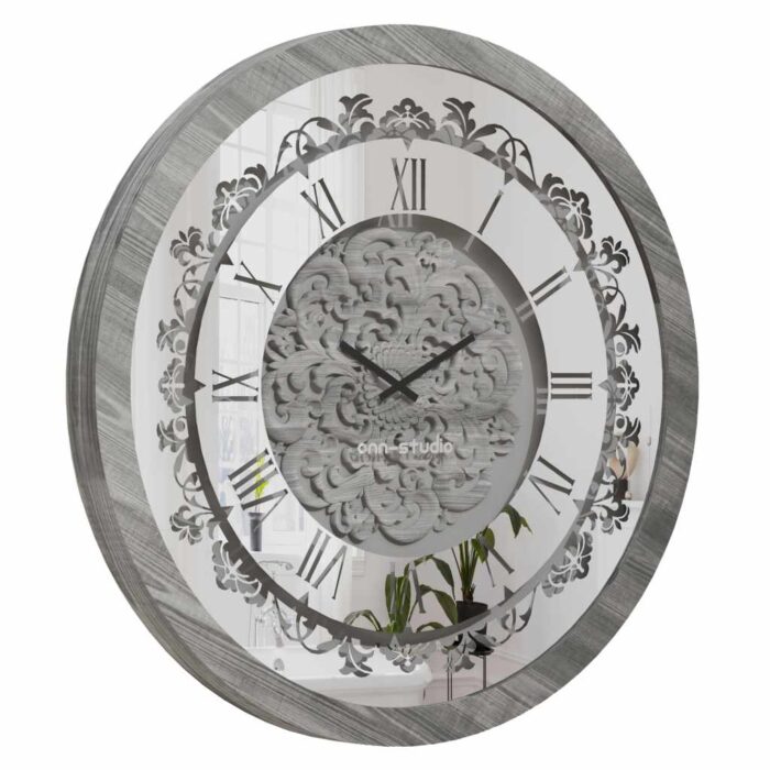 Introducing our stunning Roman Numeral Wall Clock - the perfect Unique Wall Art for Living Rooms! This Chic Vintage Look Round Wall Clock in Silver Patina exudes elegance and charm, making it an ideal addition to any stylish home decor. Add a touch of sophistication to your living space with this elegant timepiece, designed to be a standout Statement Piece in any room. Elevate your interior design with this exquisite clock and create a truly luxurious atmosphere in your home.