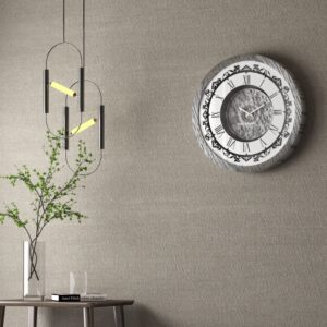 Introducing our stunning Roman Numeral Wall Clock, the perfect addition to your living room decor! This unique wall art piece features a chic vintage look with a round design in a beautiful silver patina finish. Elegant and timeless, this clock will make a statement in any room it's placed in. Elevate your space with this exquisite piece that combines functionality with style. Perfect for adding a touch of sophistication to your home, this Roman Numeral Wall Clock is sure to impress your guests and become a focal point in your space. Make a stylish statement with this elegant wall clock today!