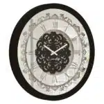Add a touch of modern elegance to your home with our Large Black Wall Clock. This unique wall clock is perfect for both the kitchen and living room, adding a stylish statement piece to your decor. Its oversized design and retro square shape make it a standout piece, while the silent vintage-inspired operation ensures it won't disrupt your space. Featuring classic Roman numerals, this antique wall clock combines timeless charm with contemporary flair. Upgrade your space with this stunning piece that is both functional and fashionable. Perfect for those seeking a large, striking clock to elevate their interior design.