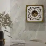 Add a touch of Boho charm to your living space with this exquisite Boho Style Roman Numeral Mirror Clock. This unique wall art piece merges vintage elegance with chic modern design, featuring a square clock in a stunning patina gold finish. The Roman numerals add a classic and sophisticated touch, making it the perfect addition to any stylish living room decor. Elevate your home decor with this elegant and eye-catching wall clock that is sure to dazzle your guests and become a focal point in your home.