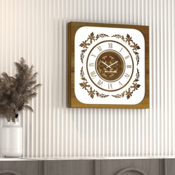 Add a touch of Boho charm to your living space with this exquisite Boho Style Roman Numeral Mirror Clock. This unique wall art piece merges vintage elegance with chic modern design, featuring a square clock in a stunning patina gold finish. The Roman numerals add a classic and sophisticated touch, making it the perfect addition to any stylish living room decor. Elevate your home decor with this elegant and eye-catching wall clock that is sure to dazzle your guests and become a focal point in your home.