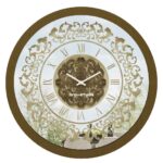 Add a touch of vintage charm to your home or office with this exquisite Vintage Floral Bronze Effect Wall Clock. Featuring elegant Roman numerals on a large round mirror, this artisan timekeeper is a statement piece that will elevate any space. Handmade with care, this wooden clock is perfect for adding a touch of sophistication to your living room decor. Make a statement with this elegant wall clock that combines beauty and functionality in one stunning piece.