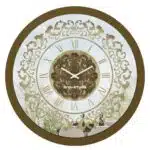 Add a touch of vintage charm to your home or office with this exquisite Vintage Floral Bronze Effect Wall Clock. Featuring elegant Roman numerals on a large round mirror, this artisan timekeeper is a statement piece that will elevate any space. Handmade with care, this wooden clock is perfect for adding a touch of sophistication to your living room decor. Make a statement with this elegant wall clock that combines beauty and functionality in one stunning piece.