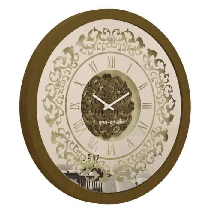 Add a touch of vintage charm to your home or office with this exquisite Vintage Floral Bronze Effect Wall Clock. Featuring elegant Roman numerals on a large round mirror, this artisan timekeeper is a statement piece that will elevate any space. Handmade with care, this wooden clock is perfect for adding a touch of sophistication to your living room decor. Make a statement with this elegant wall clock that combines beauty and functionality in one stunning piece.