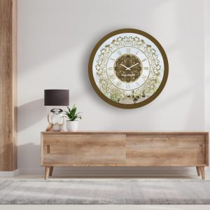 Round bronze effect mirrored wall clock in a white room.