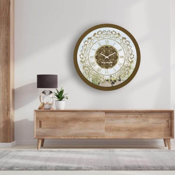 Add a touch of vintage charm to your home or office with this exquisite Vintage Floral Bronze Effect Wall Clock. Featuring elegant Roman numerals on a large round mirror, this artisan timekeeper is a statement piece that will elevate any space. Handmade with care, this wooden clock is perfect for adding a touch of sophistication to your living room decor. Make a statement with this elegant wall clock that combines beauty and functionality in one stunning piece.