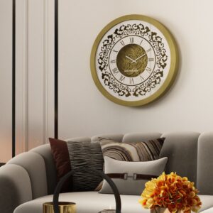 Introducing our exquisite Vintage Floral Bronze Effect Wall Clock with Roman Numerals, a stunning addition to any space. This large round mirror clock is not just a timekeeper, but a true artisan piece for your home or office decor. Its elegant design makes it a statement piece in any room, while adding a touch of sophistication and charm. Handmade with care, this wooden clock is perfect for enhancing your living room decor or bringing a unique touch to your workspace. Upgrade your space with this one-of-a-kind timepiece that effortlessly merges style and function.
