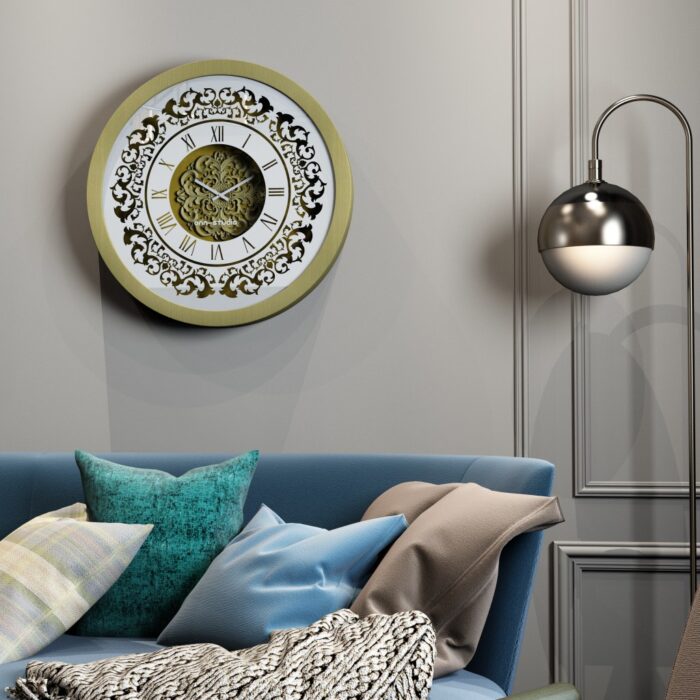 Add a touch of timeless elegance to your home or office with this stunning Vintage Floral Bronze Effect Wall Clock. Featuring classic Roman numerals on a large round mirror, this artisan timekeeper is sure to make a statement in any room. Handmade with care, this elegant wall clock is the perfect addition to your living room decor or as a centerpiece for your space. Crafted from high-quality wood, this unique clock is both functional and stylish, making it a beautiful and practical accent piece for your home. Elevate your interior with this exquisite handmade clock today!