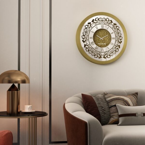 Add a touch of timeless elegance to your home or office with this stunning Vintage Floral Bronze Effect Wall Clock. Featuring classic Roman numerals on a large round mirror, this artisan timekeeper is sure to make a statement in any room. Handmade with care, this elegant wall clock is the perfect addition to your living room decor or as a centerpiece for your space. Crafted from high-quality wood, this unique clock is both functional and stylish, making it a beautiful and practical accent piece for your home. Elevate your interior with this exquisite handmade clock today!