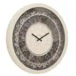 Add a touch of timeless elegance to your living space with our Round Beige Colour Wall Clocks. This Vintage Clock features Roman Numerals and a Traditional Floral design that will elevate any room's decor. Handcrafted by skilled artisans, this Large wall clock makes for a stunning statement piece in any home. Its silent operation ensures a peaceful ambiance while its Decorative Mirrored finish adds a touch of sophistication. The Aesthetic design of this Unique wall clock blends seamlessly with both traditional and modern interior styles, making it the perfect Housewarming gift or addition to your own collection. Embrace a touch of Retro design and Boho Wall Art with this Handmade wall clock that exudes charm and character. Upgrade your Interior Design with this one-of-a-kind clock that will instantly enhance your room decor.