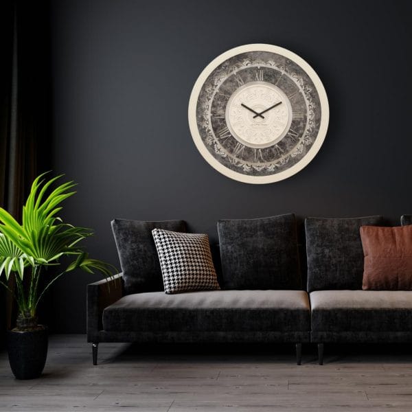 Round shell patina mirrored wall clock hanging in black living room.