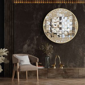 Round mosaic gold mirror with Persian calligraphy hanging in brown room.