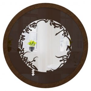 Onn Studio's Round Walnut Mirror with Persian calligraphy.