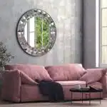 Add a touch of elegance to your living space with this Round Large Gold Mirror. Perfect for adding a glamorous touch to your aesthetic living room decor or sprucing up your bathroom vanity. This unique entryway mirror features a stunning sunburst design, making it a statement piece in any room. Elevate your room decor with this boho wall art that will surely catch the eye of all your guests. Bring style and sophistication to your home with this exquisite gold mirror.