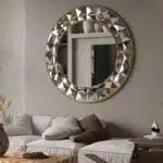 Add a touch of elegance to your living space with this Round Large Gold Mirror. Perfect for adding a glamorous touch to your aesthetic living room decor or sprucing up your bathroom vanity. This unique entryway mirror features a stunning sunburst design, making it a statement piece in any room. Elevate your room decor with this boho wall art that will surely catch the eye of all your guests. Bring style and sophistication to your home with this exquisite gold mirror.