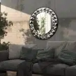 Add a touch of elegance and style to your space with this Round Large Gold Mirror. Whether you're looking to enhance your living room or update your bathroom vanity, this stunning piece of room decor is the perfect choice. The unique sunburst design makes it a standout piece of boho wall art, adding a touch of sophistication to any room. Elevate your home decor with this eye-catching mirror, sure to impress in any setting, be it as a unique entryway mirror or a focal point in your living space.