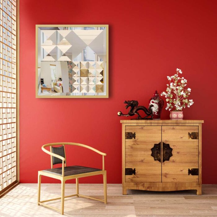 Add a touch of modern elegance to your home decor with this stunning square asymmetrical mirror. Handmade with an aesthetic design, this boho style wall mirror features a unique combination of gold and black, adding a chic and luxurious look to any space. Perfect for a bathroom vanity or as a statement piece in the living room, this piece of wall art doubles as a practical and stylish addition to your home. Whether you're looking for a housewarming gift or simply want to elevate your room decor, this elegant mirror is sure to impress with its one-of-a-kind design.