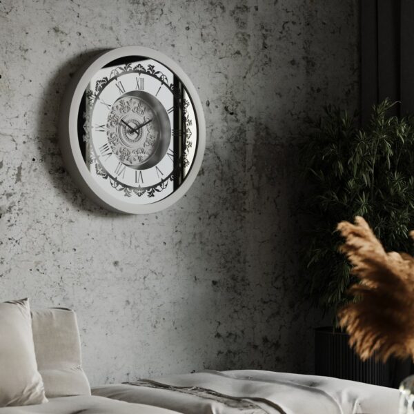 A wall-mounted clock displaying the time, featuring a classic design and clear numerals for easy readability.