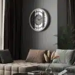 A wall-mounted clock displaying the time, featuring a classic design and clear numerals for easy readability.