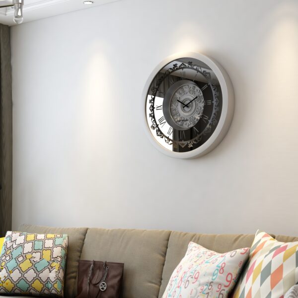 A wall-mounted clock displaying the time, featuring a classic design and clear numerals for easy readability.