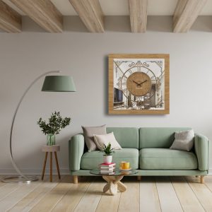 Square antique khaki mirrored wall clock in pale green and grey room.