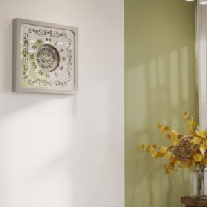 Square oversized wall clock with a silver wooden frame, mirrored glass face, Roman numerals, and floral wood center.