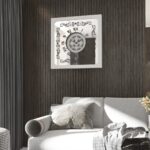 Square oversized wall clock with a silver wooden frame, mirrored glass face, Roman numerals, and floral wood center.