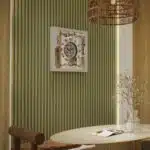 Square oversized wall clock with a silver wooden frame, mirrored glass face, Roman numerals, and floral wood center.