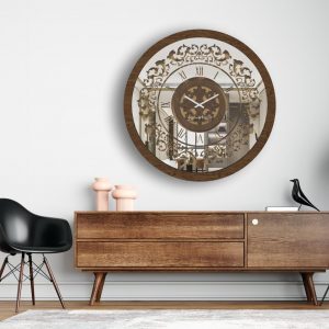Round walnut mirrored wall clock hanging in a white living room.