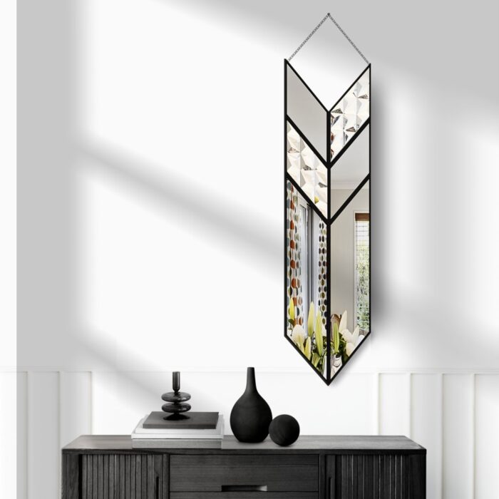 Elevate your living space with this stunning Arrow Shape Mirror that is sure to make a statement in any room. This Unique Wall Mirror is perfect for Living Room Decor, adding a touch of contemporary elegance to your home. The Asymmetrical Irregular design of this Bathroom Vanity Mirror makes it a standout piece, while also serving as a functional decor item. Bring a touch of modern flair to your space with this Wall Art Decor for Chic Homes, designed to complement a variety of interior styles. This Modern Stylish Minimal Mirror is a must-have for those seeking a unique and sophisticated addition to their home decor collection.