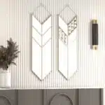 Elevate your living space with this stunning Arrow Shape Mirror that is sure to make a statement in any room. This Unique Wall Mirror is perfect for Living Room Decor, adding a touch of contemporary elegance to your home. The Asymmetrical Irregular design of this Bathroom Vanity Mirror makes it a standout piece, while also serving as a functional decor item. Bring a touch of modern flair to your space with this Wall Art Decor for Chic Homes, designed to complement a variety of interior styles. This Modern Stylish Minimal Mirror is a must-have for those seeking a unique and sophisticated addition to their home decor collection.