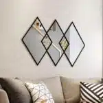 Add a touch of elegance to your space with this stunning Vanity Mirror. This unique Diamond shape Mirror features an Irregular shape and a beautiful Gold finish, making it both a functional Bathroom Mirror and a piece of Decorative Mirror art. Perfect for any Bathroom Vanity or as a statement piece in your living Room Decor, this piece is sure to enhance your Room Decor with its eye-catching design. Treat yourself or surprise a loved one with this exquisite Housewarming Gift that combines style and functionality, adding a sophisticated touch to any space in your home.