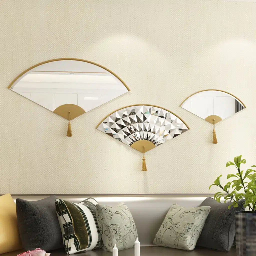 Add a touch of modern elegance to your living room with this unique asymmetrical mirror. This irregular fan-shaped mirror is the perfect addition to any space, whether used as a statement piece or as a functional bathroom vanity mirror. The combination of large and small mirrors creates a visually stunning design that will instantly elevate your home decor. Give the gift of style with this one-of-a-kind mirror, a perfect housewarming present for anyone who appreciates a contemporary and minimal aesthetic.
