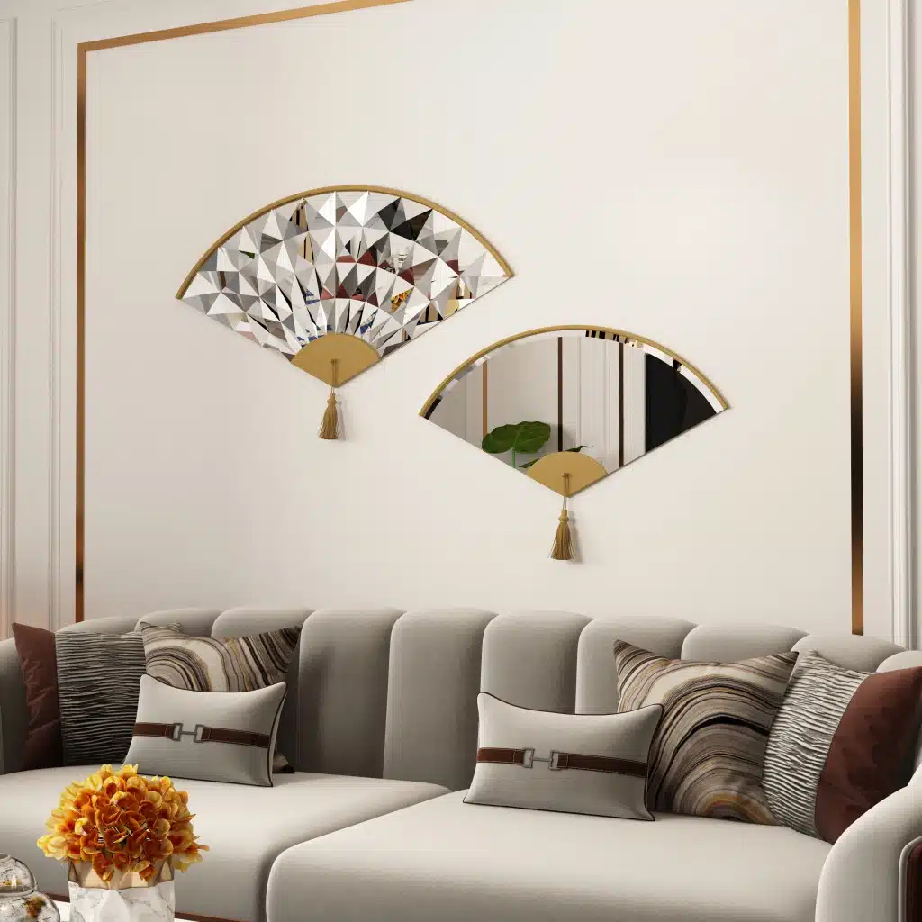 Add a touch of modern elegance to your living room with this unique asymmetrical mirror. This irregular fan-shaped mirror is the perfect addition to any space, whether used as a statement piece or as a functional bathroom vanity mirror. The combination of large and small mirrors creates a visually stunning design that will instantly elevate your home decor. Give the gift of style with this one-of-a-kind mirror, a perfect housewarming present for anyone who appreciates a contemporary and minimal aesthetic.