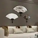 Add a touch of modern elegance to your living space with this stunning Asymmetrical Mirror for Living Room Décor. This unique irregular mirror is perfect for adding a contemporary flair to any room and makes a wonderful housewarming gift. Its fan shape design exudes a modern and minimalistic vibe, while the option of choosing between a large and small size ensures a perfect fit for your space. Whether you place it above a bathroom vanity or in the entryway, this mirror is sure to elevate the style of your home décor.