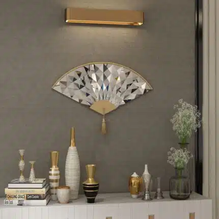 Add a touch of modern elegance to your living room décor with this unique asymmetrical mirror. Perfect for adding a contemporary flair to any space, this irregular fan-shaped mirror is both stylish and functional. Whether it's hanging in the bathroom as a vanity mirror or displayed in the living room as a statement piece, this mirror is sure to impress. Available in both large and small sizes, it also makes a thoughtful housewarming gift for your loved ones. Upgrade your home with this modern and minimalistic mirror today!