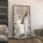 Handmade rectangular mirror with beveled edges and prism-shaped mirror art, black wooden frame.