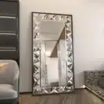Handmade rectangular mirror with beveled edges and prism-shaped mirror art, black wooden frame.