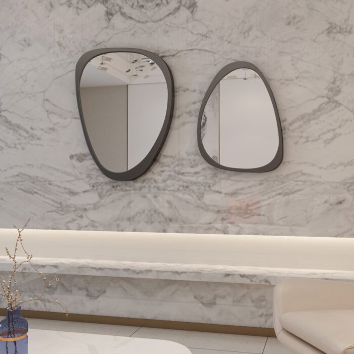 Elevate your space with this stunning Mid Century Asymmetrical Black Mirror. This Irregular Bathroom Vanity Mirror is the perfect addition to any stylish Living Room Décor. The large size makes it ideal as a statement piece or as a practical Housewarming Gift for her. Add a touch of sophistication to your home with this unique and modern wall mirror.