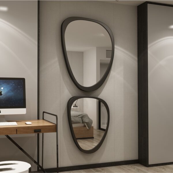 Add a touch of modern elegance to your space with this Mid Century Asymmetrical Black Mirror. This Irregular Bathroom Vanity Mirror is perfect for adding a stylish touch to your living room décor. The large size makes it a statement piece that is sure to impress. Whether you're looking for a unique mirror for her, or searching for the perfect housewarming gift, this mirror is the perfect choice. Handcrafted with care, this mirror is a stunning addition to any home.